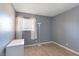 This bedroom features a neutral color scheme, bright window and sleek, minimalist decor at 1372 Lorilyn Ave # 3, Las Vegas, NV 89119