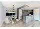 Stylish dining area adjacent to the modern kitchen with updated appliances and countertops at 1372 Lorilyn Ave # 3, Las Vegas, NV 89119