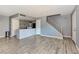 Open living space with updated kitchen, modern flooring, and fresh paint, perfect for entertaining at 1372 Lorilyn Ave # 3, Las Vegas, NV 89119