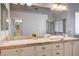 This bathroom has and sinks, with a large mirror that provides a view into the shower at 1968 Evening Glow Dr, Las Vegas, NV 89134