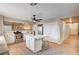 Bright, open kitchen with a central island and stainless steel appliances for a chef-inspired experience at 1968 Evening Glow Dr, Las Vegas, NV 89134