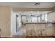 Open living space with breakfast bar, kitchen, and dining area with seamless flow and connectivity at 1968 Evening Glow Dr, Las Vegas, NV 89134