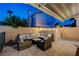 Stylish outdoor patio featuring comfortable seating, perfect for entertaining and relaxing in a private setting at 1968 Evening Glow Dr, Las Vegas, NV 89134