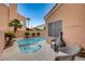 Private pool and spa area with lush tropical landscaping, offering a tranquil retreat for relaxation and enjoyment at 1968 Evening Glow Dr, Las Vegas, NV 89134