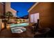 Beautiful backyard pool area with a relaxing spa, surrounded by mature landscaping for added privacy at 1968 Evening Glow Dr, Las Vegas, NV 89134