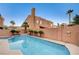 Beautiful swimming pool surrounded by lush landscaping, creating a tranquil backyard oasis at 1968 Evening Glow Dr, Las Vegas, NV 89134