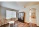 A sitting area leads into the main bathroom, separated by an arched doorway at 1968 Evening Glow Dr, Las Vegas, NV 89134