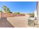 Spacious backyard with drought-tolerant landscaping and privacy fence at 2109 Mountain Sunset Ave, North Las Vegas, NV 89031