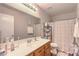 Bathroom featuring a single sink vanity, ample countertop space, and shower-tub combination at 2109 Mountain Sunset Ave, North Las Vegas, NV 89031