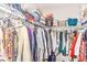 Walk-in closet with ample hanging space and shelving for organized storage at 2109 Mountain Sunset Ave, North Las Vegas, NV 89031
