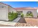 Well-maintained single-story home with a two-car garage and desert-style landscaping at 2109 Mountain Sunset Ave, North Las Vegas, NV 89031
