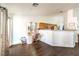 Bright, open living area with wood floors, neutral walls, and open access to the kitchen at 2109 Mountain Sunset Ave, North Las Vegas, NV 89031