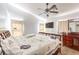 Spacious main bedroom with ceiling fan, large windows and neutral tones at 2109 Mountain Sunset Ave, North Las Vegas, NV 89031