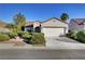 Charming single story home featuring desert landscaping and a two car garage at 2150 Maple Heights Ct, Henderson, NV 89052