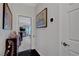 Hallway with dark floors leading to bedroom featuring comfortable carpet at 2150 Maple Heights Ct, Henderson, NV 89052