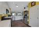 Well-lit kitchen featuring stainless steel appliances, ample counter space, and stylish cabinets, perfect for modern living at 2150 Maple Heights Ct, Henderson, NV 89052