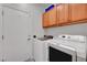 Laundry room features a washing machine and dryer at 2150 Maple Heights Ct, Henderson, NV 89052