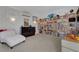 Bright living room with custom bookshelves and comfortable seating area at 2150 Maple Heights Ct, Henderson, NV 89052