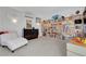 Bright living room with custom bookshelves and comfortable seating area at 2150 Maple Heights Ct, Henderson, NV 89052