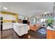Open-concept living room featuring a kitchen and cozy seating area at 2150 Maple Heights Ct, Henderson, NV 89052