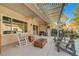 Inviting outdoor patio with pool, lounge chairs and a fire pit at 2150 Maple Heights Ct, Henderson, NV 89052