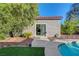 Charming pool house with sliding glass doors and beautiful landscaping at 2150 Maple Heights Ct, Henderson, NV 89052