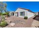 Low maintenance desert landscaped backyard with small plants, rocks, and privacy at 2508 Chasma Dr, Henderson, NV 89044