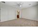 Spacious bedroom showcasing two closets and a doorway to the bathroom at 2508 Chasma Dr, Henderson, NV 89044