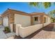 Cozy home with stylish stone detailing, a gated entrance, and well-maintained desert landscaping at 2508 Chasma Dr, Henderson, NV 89044
