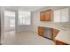 View from kitchen towards open living room featuring tile floors and neutral paint at 2508 Chasma Dr, Henderson, NV 89044