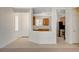 Open-concept living room and kitchen with tile flooring and neutral paint at 2508 Chasma Dr, Henderson, NV 89044