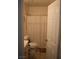 Standard bathroom with white toilet, shower with curtain, and tiled floor at 2520 E Ambush St, Pahrump, NV 89048