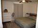 Cozy bedroom featuring a comfortable bed, neutral tones, and ceiling fan at 2520 E Ambush St, Pahrump, NV 89048
