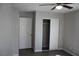 Bright bedroom with closet and wood-look flooring at 2520 E Ambush St, Pahrump, NV 89048
