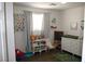 Bright bedroom with wood-look flooring and storage at 2520 E Ambush St, Pahrump, NV 89048