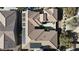 Stunning aerial view of the home showing a well-designed roof, solar panels, and desert landscaping at 2585 Portsmouth Creek Ave, Henderson, NV 89052