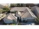 Beautiful aerial view of the home showcasing the tile roof, landscaping, and stucco exterior at 2585 Portsmouth Creek Ave, Henderson, NV 89052