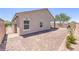 Enclosed backyard with brick patio, desert landscaping, and convenient BBQ grill at 326 Zenith Crest St, Henderson, NV 89015