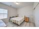 Cozy bedroom with a comfortable bed, natural light, and a closet for storage at 326 Zenith Crest St, Henderson, NV 89015