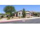Well-maintained single-story home with desert landscaping, paver driveway, and a lovely exterior at 326 Zenith Crest St, Henderson, NV 89015