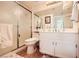 Bright bathroom with a white vanity, shower, and tile floors at 333 Abbington St, Henderson, NV 89074