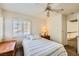 Bedroom with a ceiling fan and plantation shutters allowing natural light at 333 Abbington St, Henderson, NV 89074
