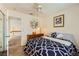 Cozy bedroom featuring a ceiling fan and a hallway entrance at 333 Abbington St, Henderson, NV 89074