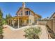 Charming two-story home with a covered patio, brick paving and a well maintained yard at 333 Abbington St, Henderson, NV 89074
