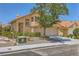 Charming two-story home with a well-maintained front yard and a two-car garage at 333 Abbington St, Henderson, NV 89074