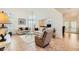 Bright living room features tile flooring, neutral colors, and many shuttered windows providing plenty of light at 333 Abbington St, Henderson, NV 89074
