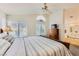 Comfortable bedroom featuring natural light, plush carpeting, and views of the bathroom at 333 Abbington St, Henderson, NV 89074