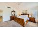 Relaxing main bedroom featuring wood furniture, carpeted floors and a bright ceiling fan at 333 Abbington St, Henderson, NV 89074