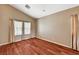 Comfortable bedroom with hardwood floors and large windows at 3609 Blue Pimpernel Ave, North Las Vegas, NV 89081