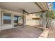 The covered patio overlooks a low-maintenance backyard and has a sliding glass door at 3609 Blue Pimpernel Ave, North Las Vegas, NV 89081